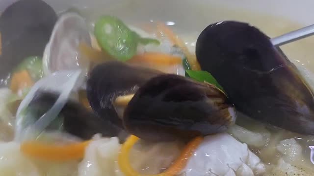 Korean style Seafood Handpull dough soup!