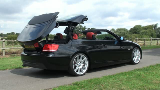 convertible opening the hood