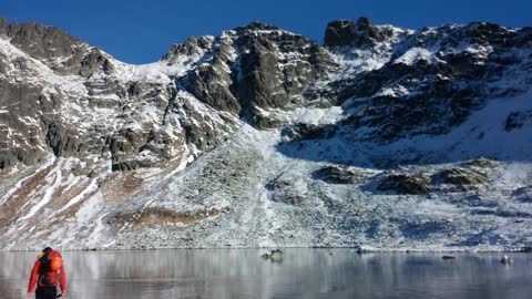 Walking on beautiful clean ice in Slovakian Mountains