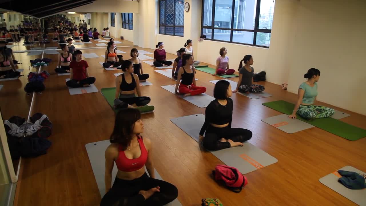 Women yoga practice class room morning yoga female