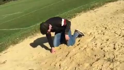 Black sweater sand flip faceplant