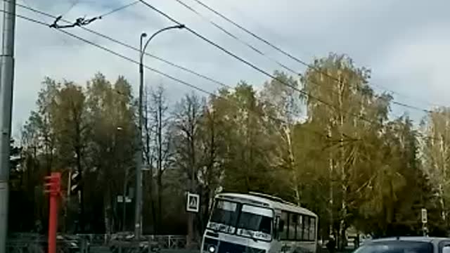 City Bus Takes Down Traffic Pole