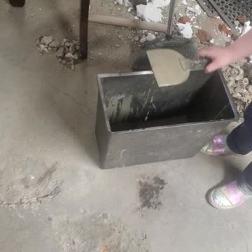 Demo girl patches concrete holes