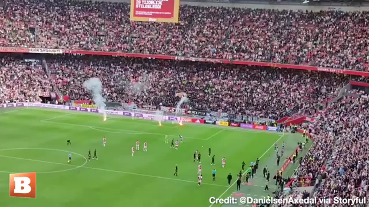 SOCCER MATCH CALLED OFF AFTER ANGRY FANS THROW FLARES ON FIELD, THEN RIOT OUTSIDE STADIUM