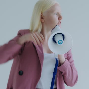A Woman Screaming on a Megaphone
