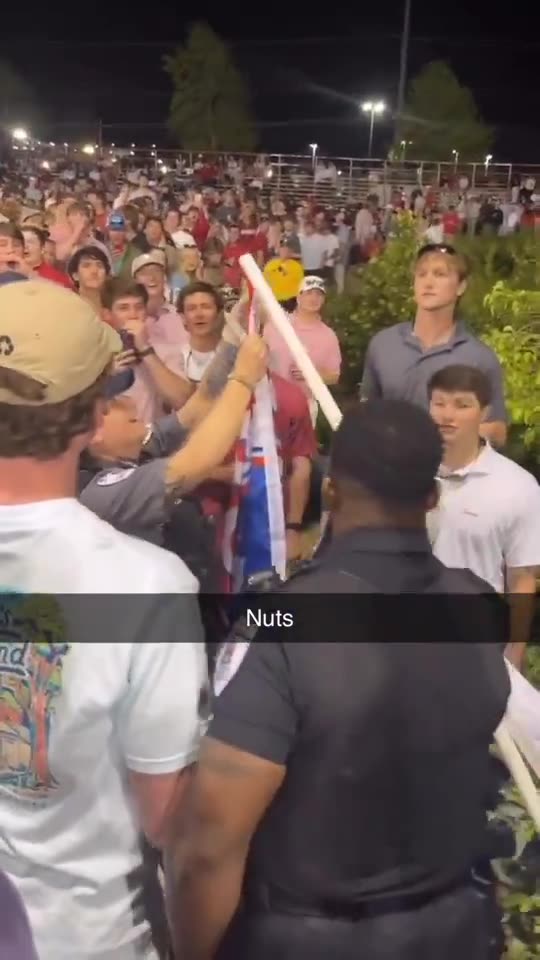 University of Arkansas Police cut down a pro-Trump flag at a baseball game