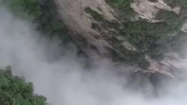 Drone taking pictures of mountain top scenery