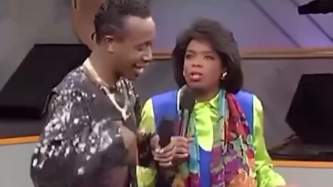 MC Hammer explains "Hammer Time" and shows Oprah how to do the dance (1990)