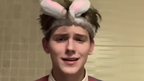 boy with bunny ears