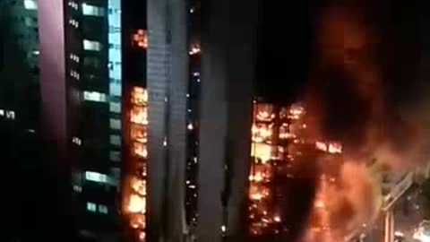 Building Catches Fire and Collapses
