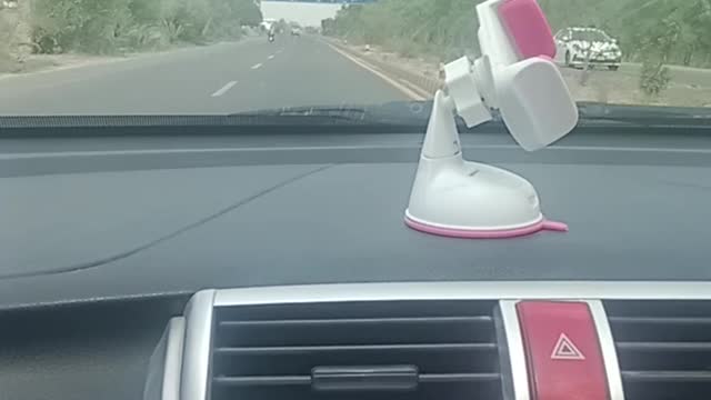 Music in car on the road with friends