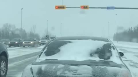 Polite and kind road rage in snow, in Canada