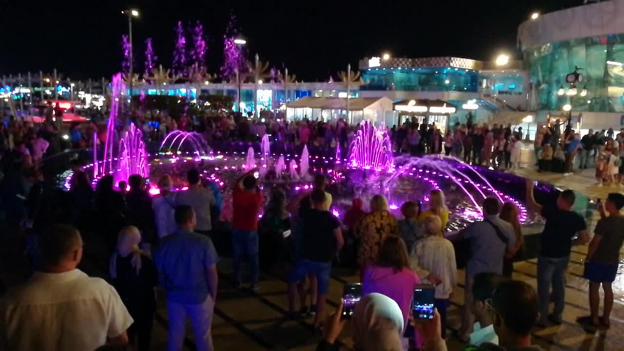 Tourists Gathering Around Wonderful Old Magical Fountain