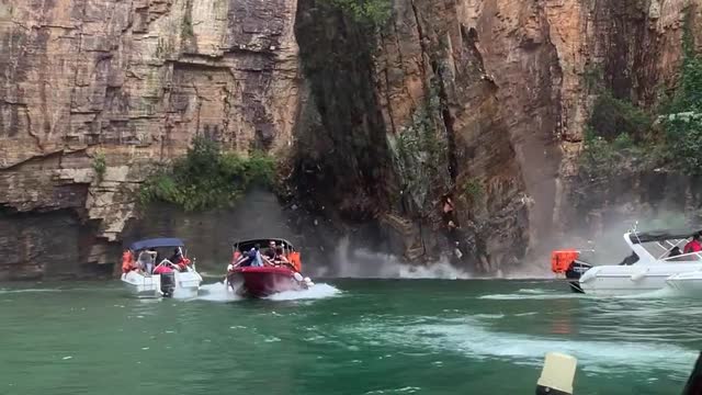 Rock Formation Falls on Boating Tourists