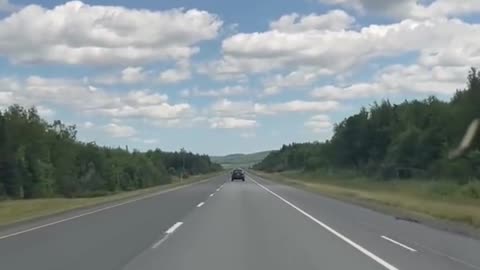 Look at the blue sky and white clouds.