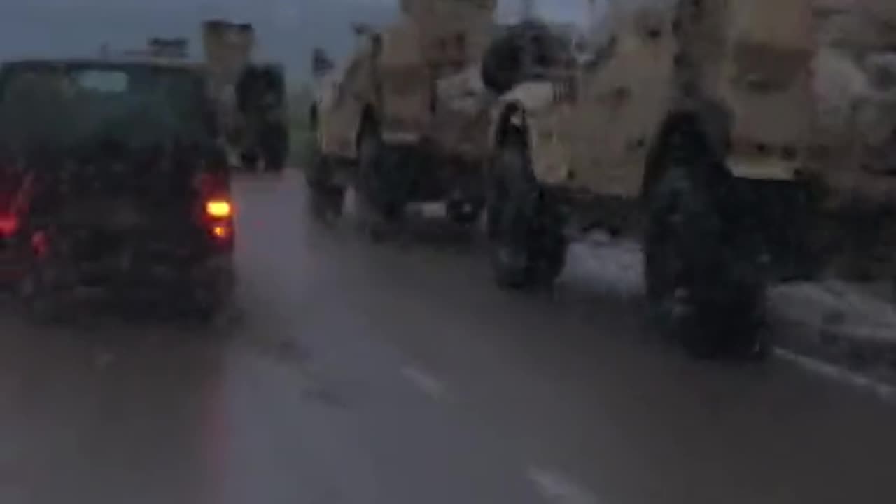 A column of American armored vehicles Oshkosh M-ATV on the way to the front line.