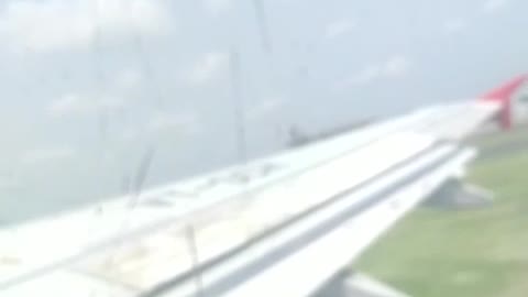 Video of the plane taking off . Airplane video while flying in the sky .