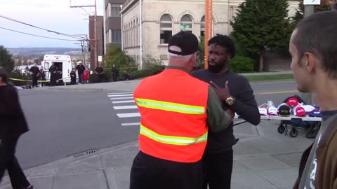 "America Was Never Great" Trolls Gets Schooled By A Black Trump Supporter At Washington Trump Rally