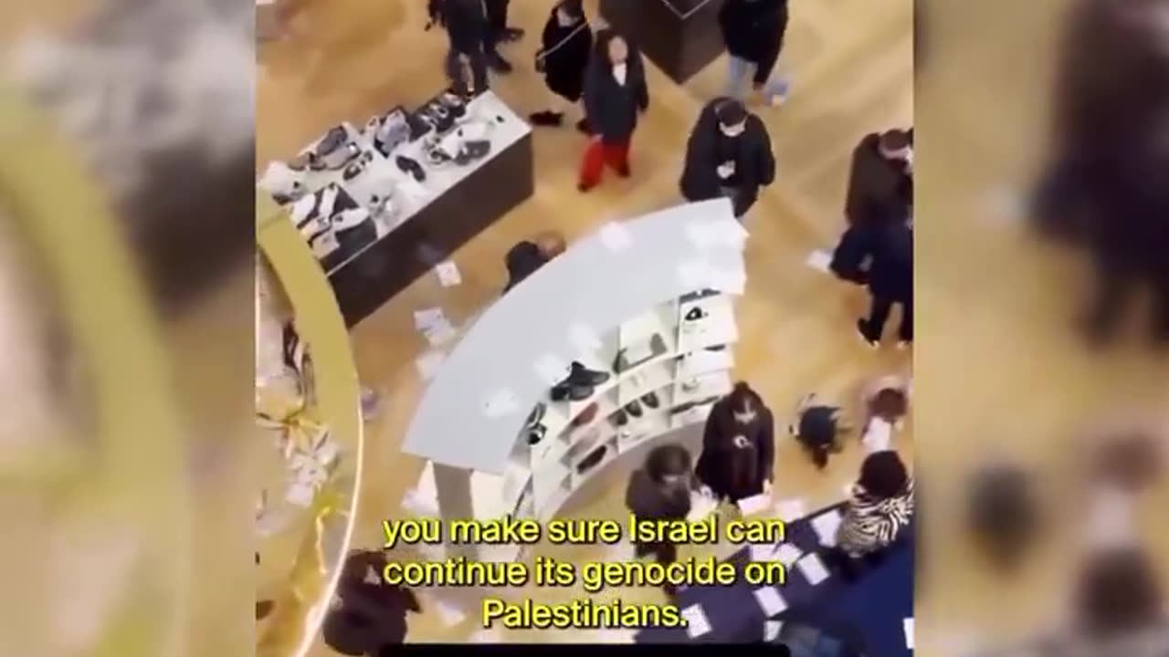 Palestine activists in a shopping mall in Amsterdam call for a boycott of brands