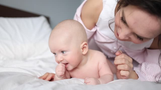 Mother Taking Care of Her Baby