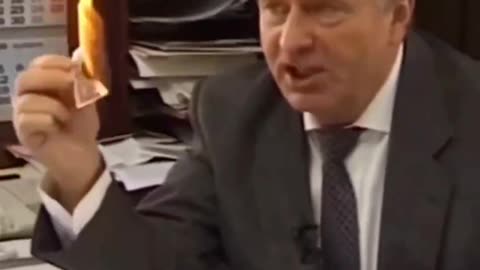 The late honorable Zhirinovsky demonstrates the value of the US currency