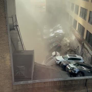Another angle of parking garage collapse