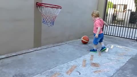 22 months old baby playing basketball