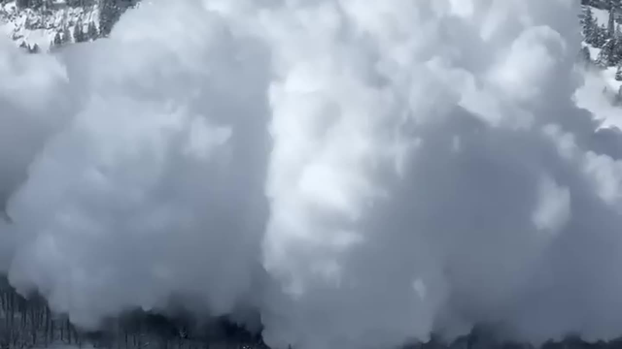 AVALANCHE TUMBLES TOWARD SKIERS IN UTAH