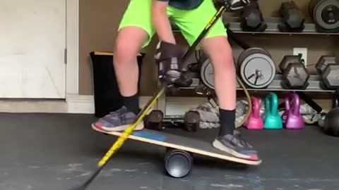 World Record Holder Kid Does Stickhandling While Standing on Balancing Board