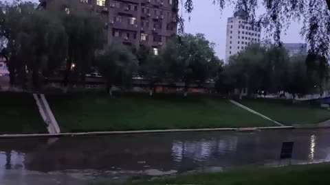 people walking across the river