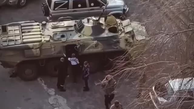 In Energodar, Russian servicemen allowed the local children to climb on equipment to the delight of the local children