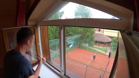 Guy Lands a Basket Through a 2nd Floor Window With a Volleyball