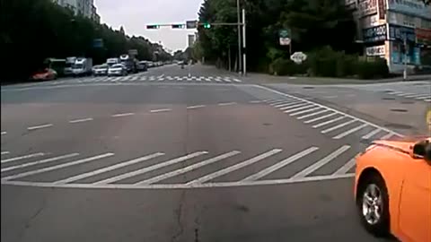 Woman Jaywalking An On Phone Has Close Call