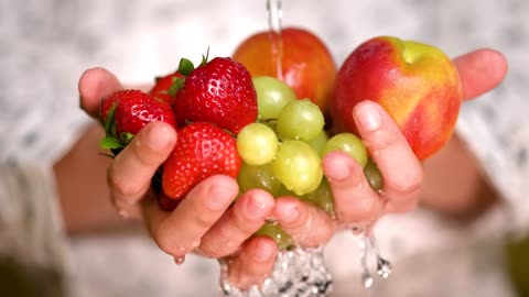 apples and grapes holding hands