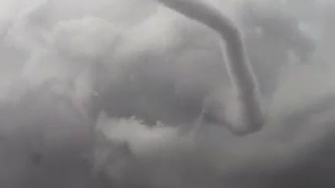 Impressive close-up of a tornado forming in the sky