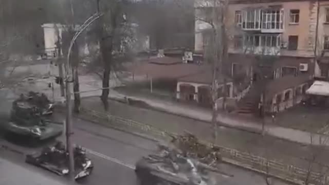 Local residents post video of Russian military armored vehicles in now liberated city Kherson