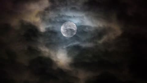 Moon And Clouds In The Night Sky