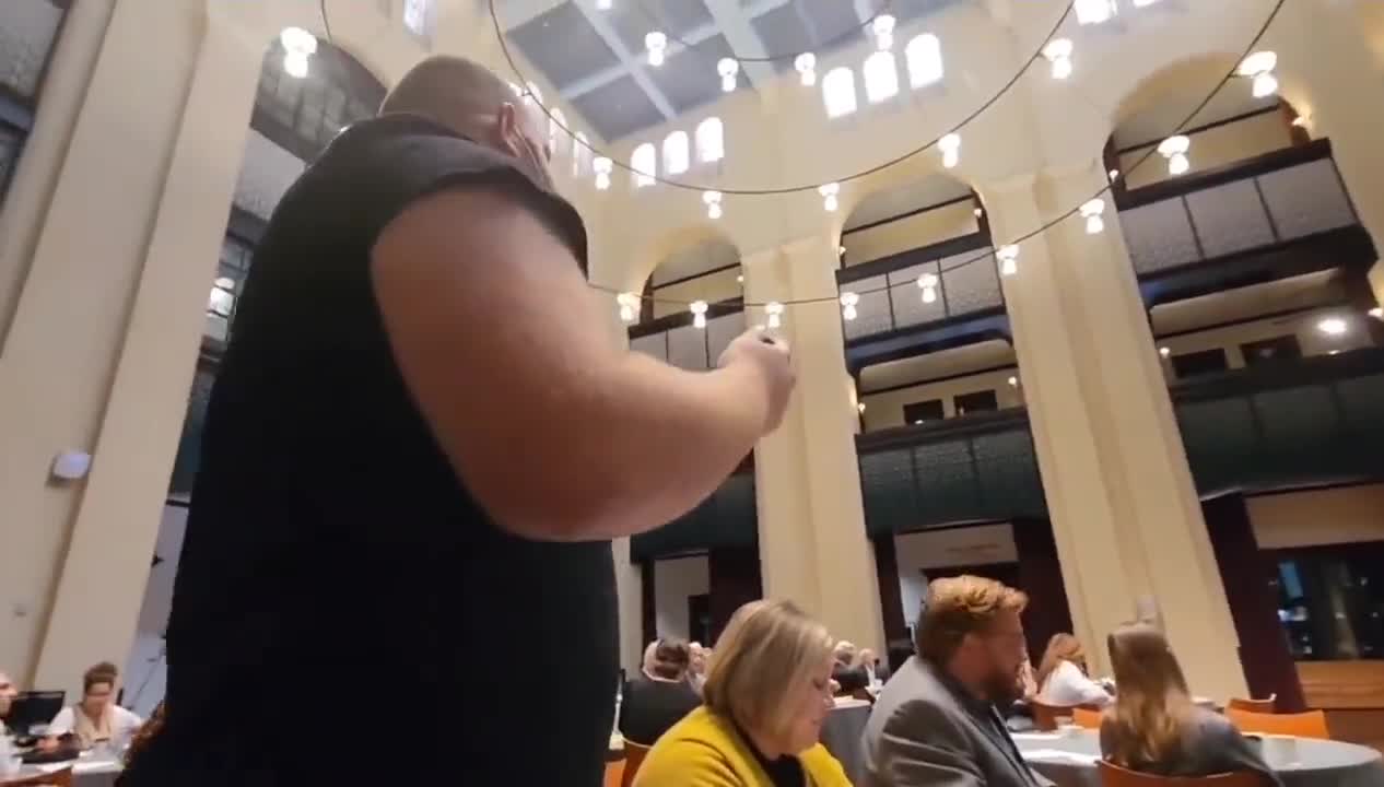 Man attacked by the staff at the Texas vaccine policy symposium