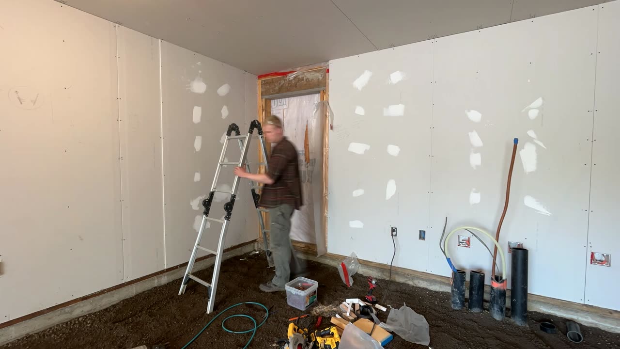 Pouring the garage floor in the rental...