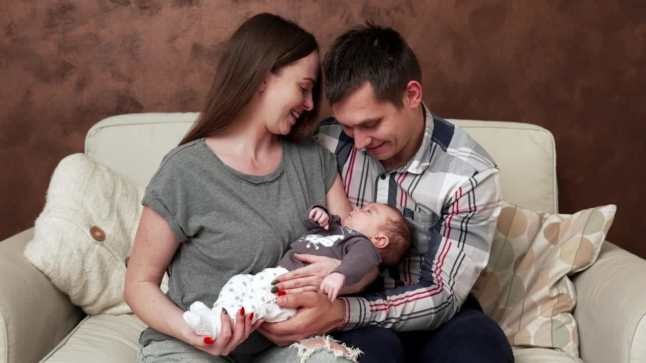 Young couple with their newborn