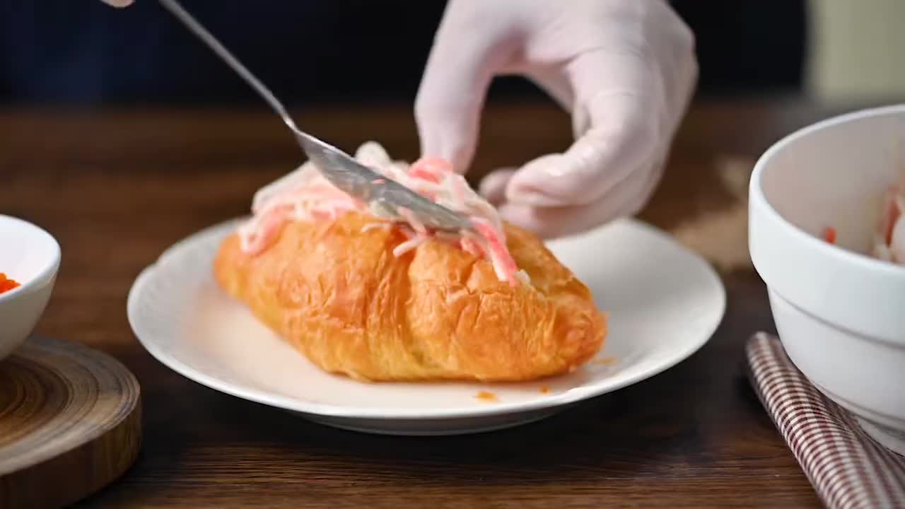 A croissant with all kinds of toppings, easy to do at home.