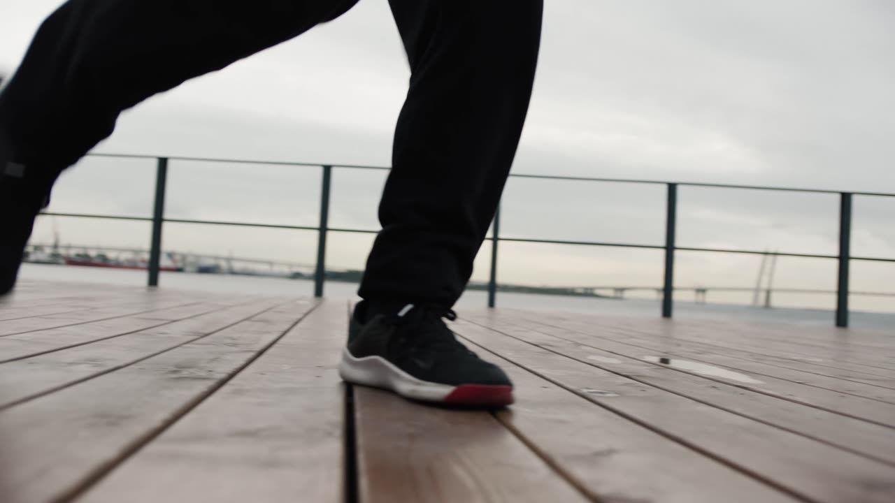 Man Showing The Footsteps In Dancing