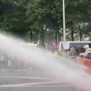 Climate Activists get BLASTED with Water in Netherlands by FIRE TRUCKS!