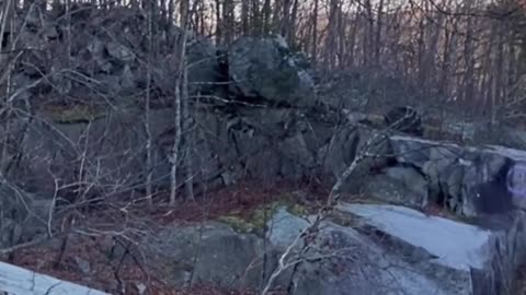 STANDING ATOP OLD GRANITE QUARRY