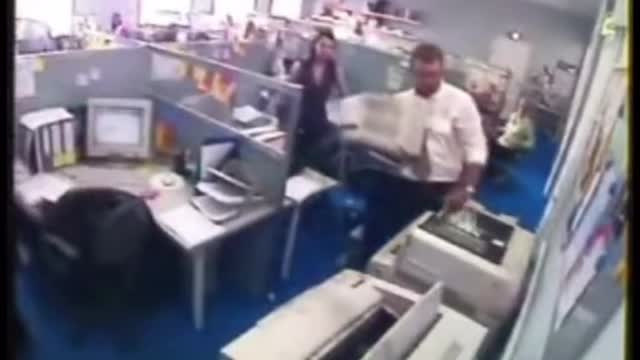 Man" Loses" his Temper With the Printer