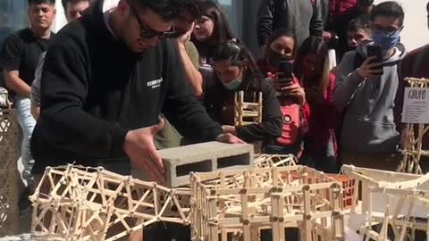 Interns Show Off Popsicle Stick Bridges
