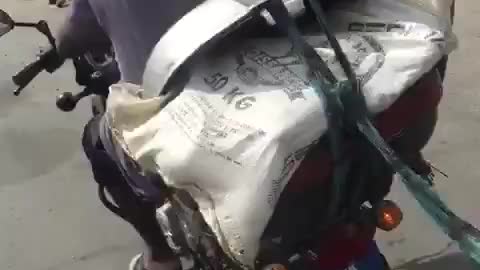 Funny african motorbike driver lol