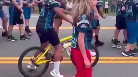 Kids Cheer for Trump Sign in Parade. Out of the mouth of babes.