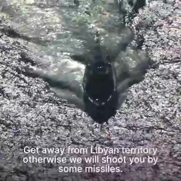 The Libyan coast guard threatened to blow up an aircraft belonging to