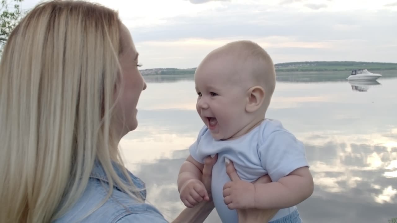 mom playing her little child.